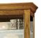 Top detail of the Howard Miller Tyler VII 680-646 Oak Curio Cabinet