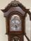 dial detail of the Howard Miller 610-979 Vue De Paris Grandfather Clock